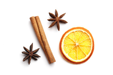 Fototapeta na wymiar Dried citrus fruits with cinnamon, star anise on white background. Mulled Wine Ingredients