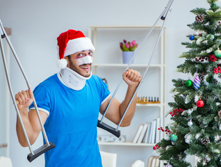 Injured man celebrating christmas at home