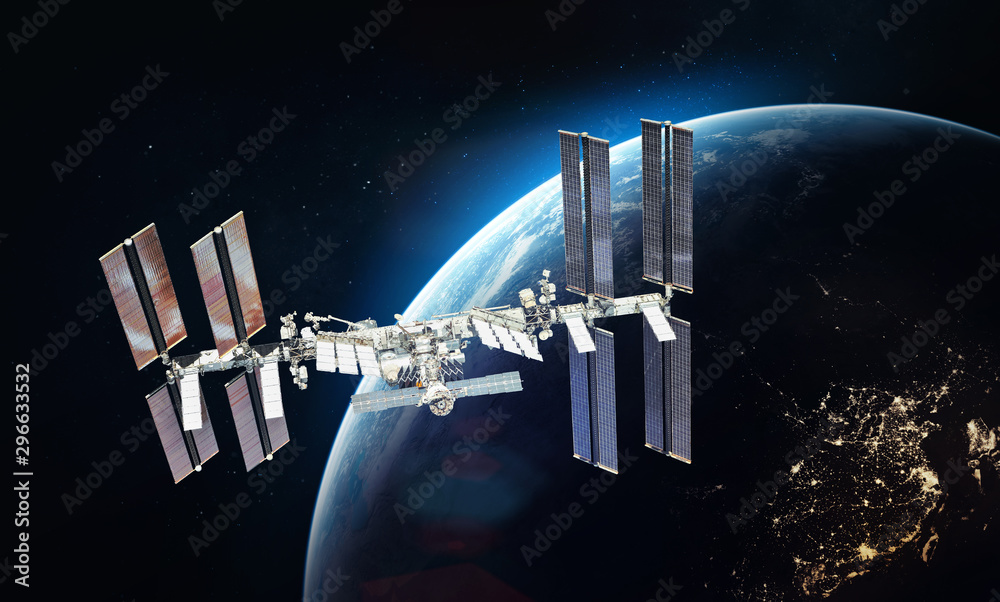 Poster iss space station on orbit of the earth planet. blue light on background. elements of this image fur