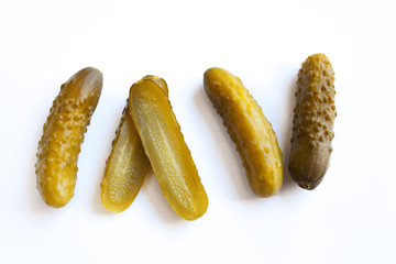 Pickled cucumbers on a white background