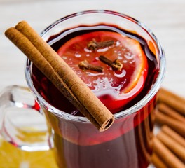 The mulled wine glintwine served in glasses for christmas table