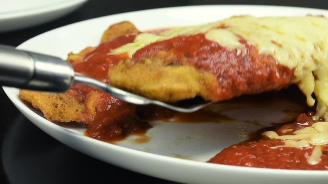 Slide on french fries and and takin a steak parmigiana 