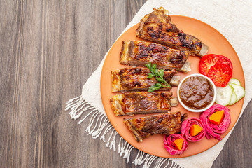 BBQ pork ribs with fermented, baked and fresh vegetables