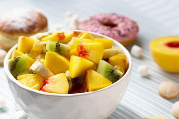 Fruit salad and sweets. Tasty and healthy breakfast