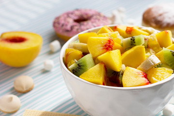  Fruit salad and sweets. Tasty and healthy breakfast