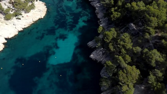 Aerial clip over on the cliffs, Calanques de Port Pin bay, Calanques National Park near Cassis village, Provence, South France, Europe