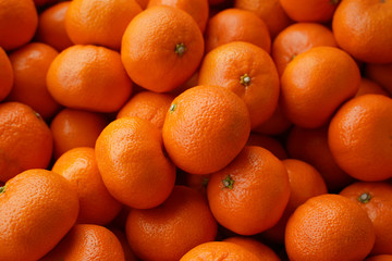 Fruit Background Of Numerous Tangerines.