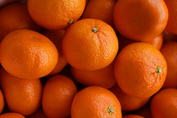 Bunch of fresh mandarin oranges on market
