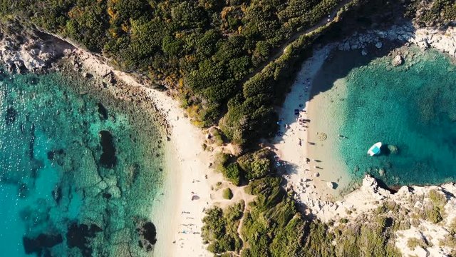 Aerial shot of butybull island. Flight over of open sea.