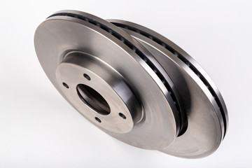 Steel brake discs for a passenger car. New spare parts for car repairs.