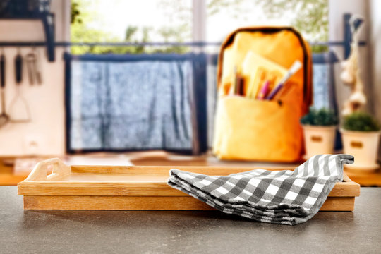 Table top with window and schoolbag background. Sunny day outside the window. School time.