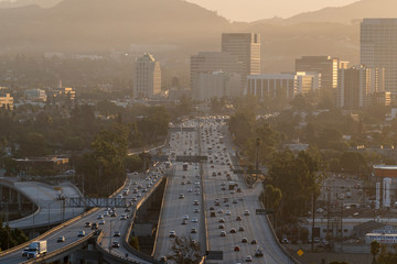 Hazy morning view of commuters on the 134 Ventura Freeway near Los Angeles in downtown Glendale,...