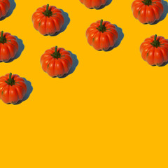 Hand-made halloween confetti in the form of spiders and spider webs and decorative pumpkin.