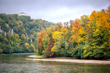 Bright autumn. Yellow and orange trees. Kelheim, Danube river, Germany autumn