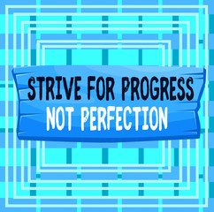 Text sign showing Strive For Progress Not Perfection. Business photo text Improve with flexibility Advance Grow Plank wooden board blank rectangle shaped wood attached color background