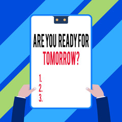 Word writing text Are You Ready For Tomorrow Question. Business photo showcasing Preparation to the future Motivation Two executive male hands holding electronic device geometrical background