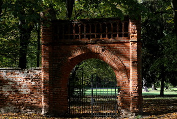 old gate in the autumn park, Poland