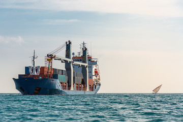 Container ship and small boat