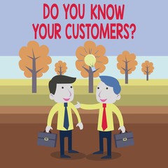 Text sign showing Do You Know Your Customers Question. Business photo text having a great background about clients Two White Businessmen Colleagues with Brief Cases Sharing Idea Solution