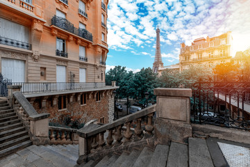 View of Eiffel Tower at sunrise from Jardins du Trocadero in Paris, France. Eiffel Tower is one of the most iconic landmarks of Paris.