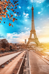 View of Eiffel Tower at sunrise from Jardins du Trocadero in Paris, France. Eiffel Tower is one of the most iconic landmarks of Paris.