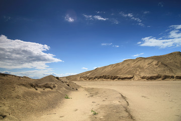 Fototapeta na wymiar Sand mining sand quarry on a clear day