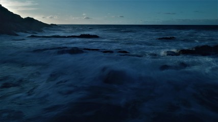 Fototapeta premium sunset from the north coast with the sea and the silk effect