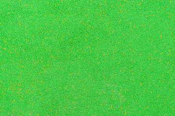 Bright green rubber crumb coating