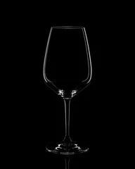 Foto op Plexiglas Silhouette of red wine glass on black background © PawelG Photo