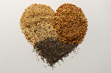 spelled buckwheat chia oats quinoa - background top view copy space