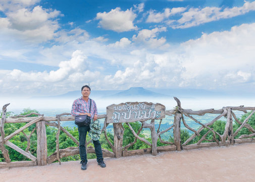 Tourist with viewpoint at the mountain in the Phu Pa por Fuji at Loei, Loei province, Thailand. (the Thai language mean: welcome to Phu Pa Por )