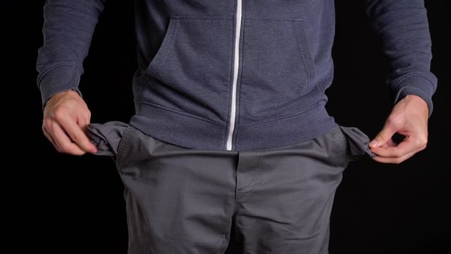 Man Turns the Empty Pockets Inside Out.