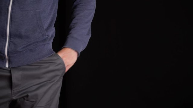 Man Turns the Empty Pockets Inside Out.