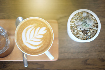 hot coffee cappuccino at the wood table