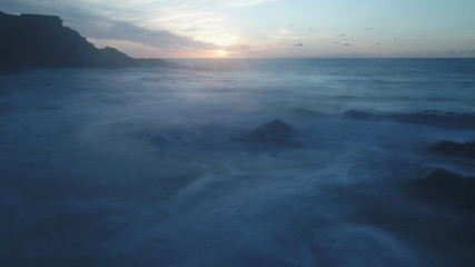 Fototapeta premium sunset from the north coast with the sea and the silk effect