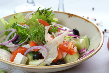 Greek salad on a light background