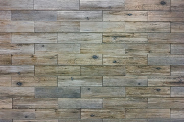 The texture of ceramic tiles stylized as a light wood.