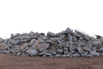 Isolates, pile of concrete scraps on the ground.