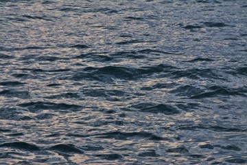 small waves on the surface of the water