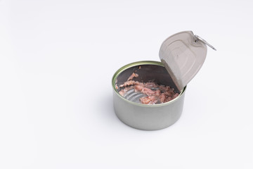 Open canned tuna tin on a white background; copy space, soft light, studio shot