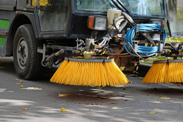 Brush on a machine for collecting fallen leaves. Special yellow machine brushes for fallen leaves...