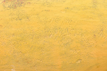 黄色に塗られた金属の表面