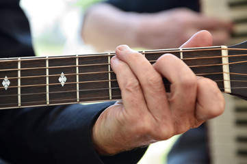 Fototapeta na wymiar man playing guitar