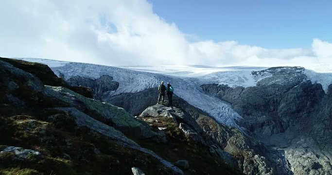 Epic drone footage of a copule watching Folgefonna glacial in Norway.