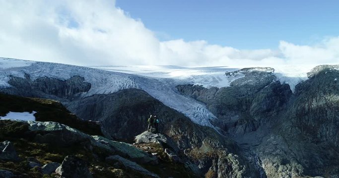 Epic drone footage of a copule watching Folgefonna glacial in Norway.