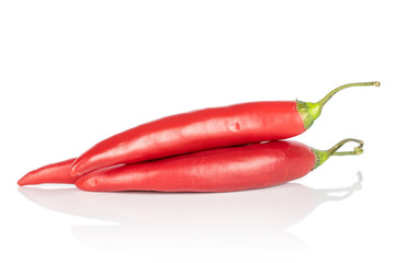 Group of two whole hot red chili cayenne heap isolated on white background