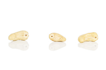 Fototapeta na wymiar Group of three whole brown nut cashew isolated on white background
