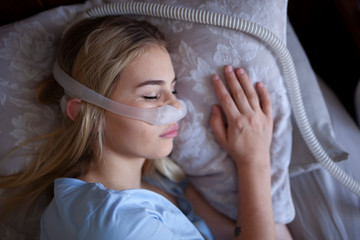 Cpap machine, Woman using sleeping sleep apnea