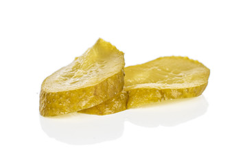 Group of two slices of sour green pickle isolated on white background