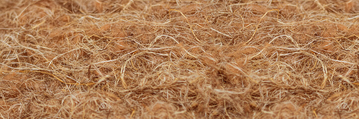 Rough fabric made from natural raw plant fiber. Horizontal long banner. Wallpaper and background...